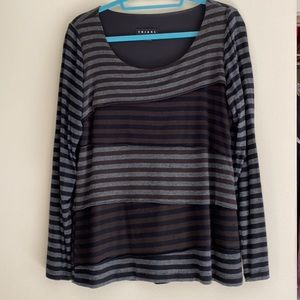 Tribal brand top with layered asymmetrical striped pattern. Size L